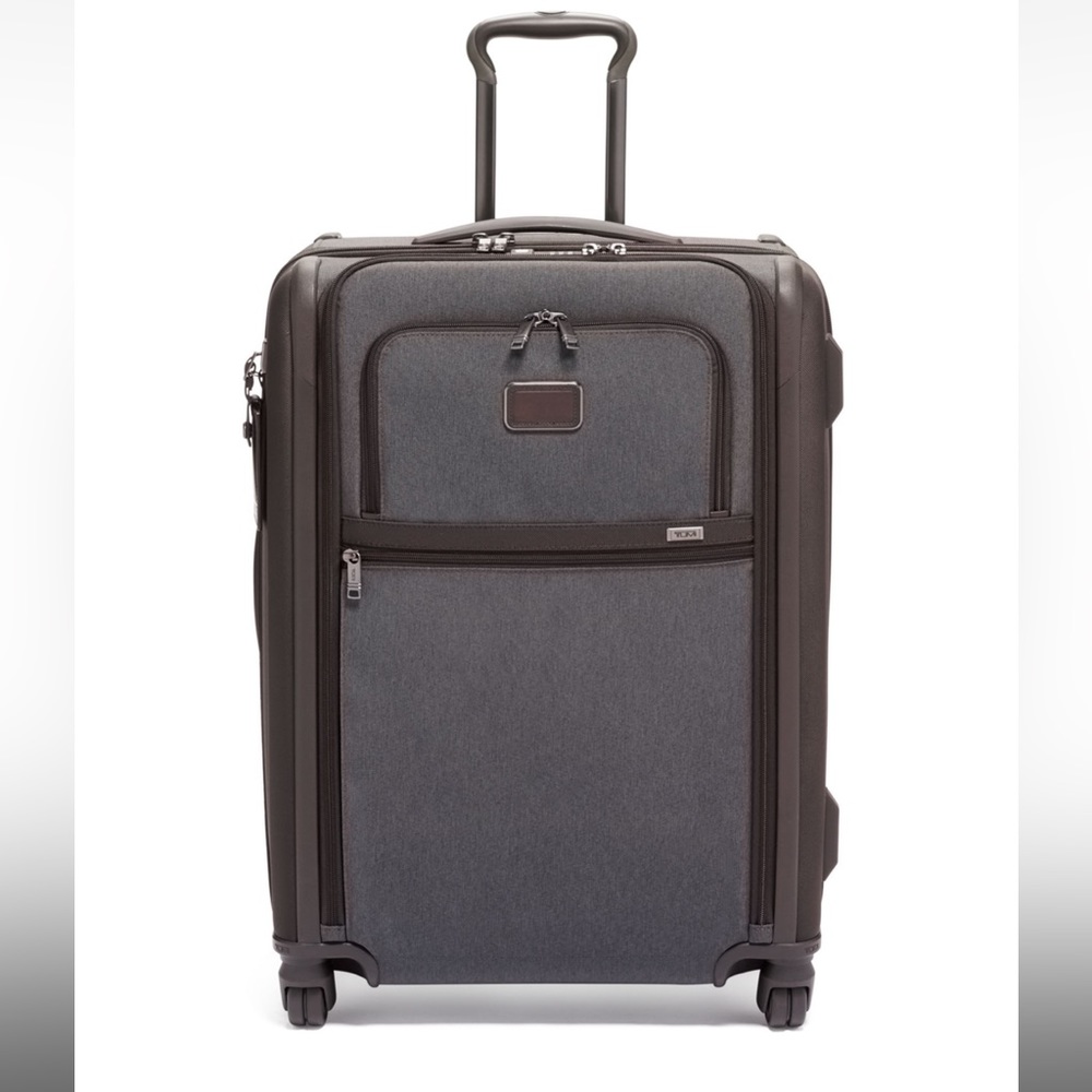 Brand new Tumi ALPHA Short Trip Expandable 4 Wheeled Packing bag.